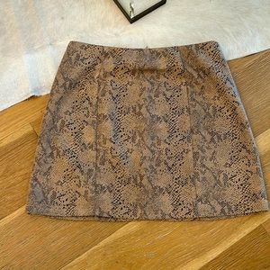 New with tags.  ee :some animal print mini skirt- size small